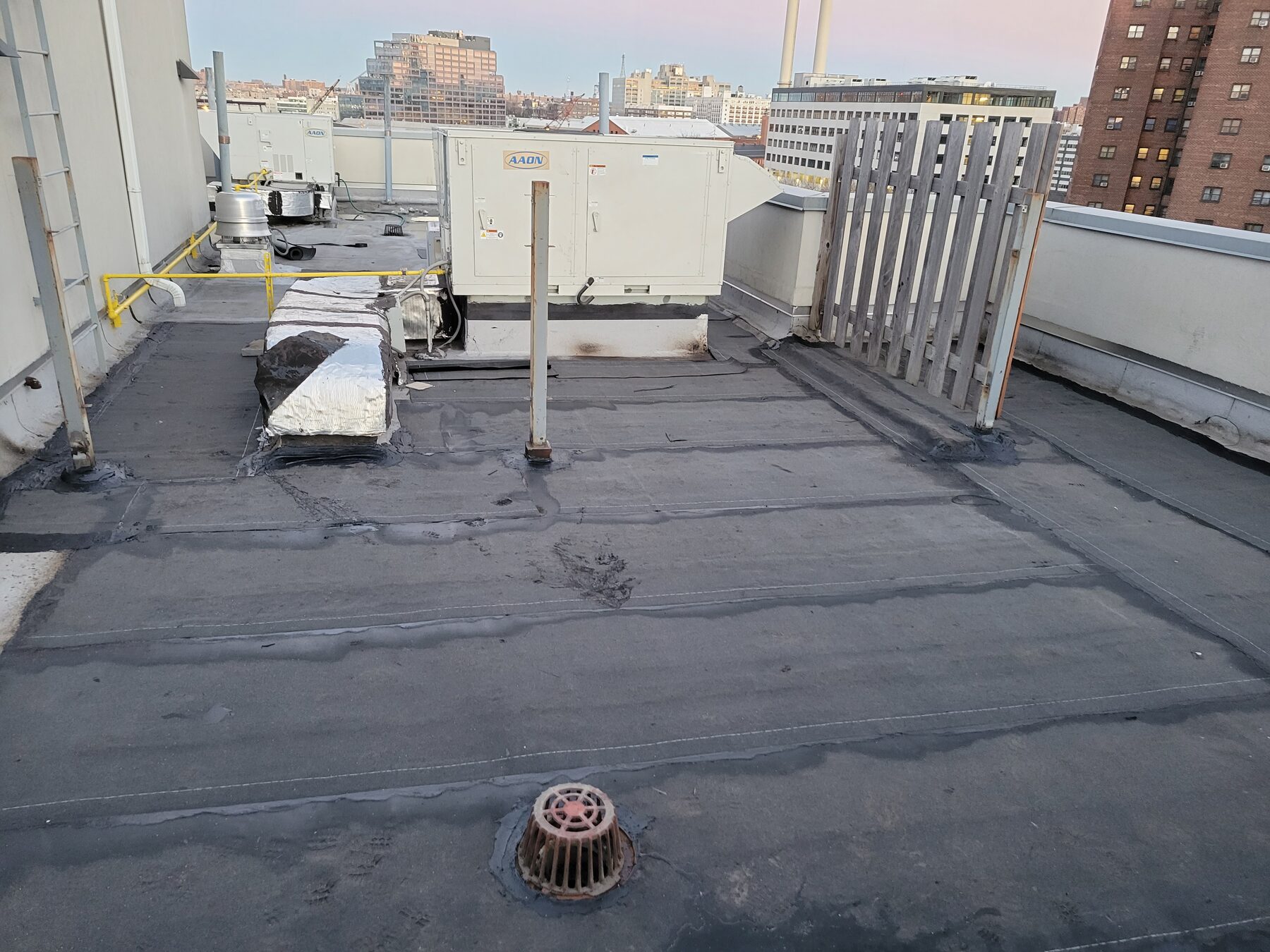 New modified bitumen roof membrane installed after leak repair, Brooklyn Heights, Brooklyn