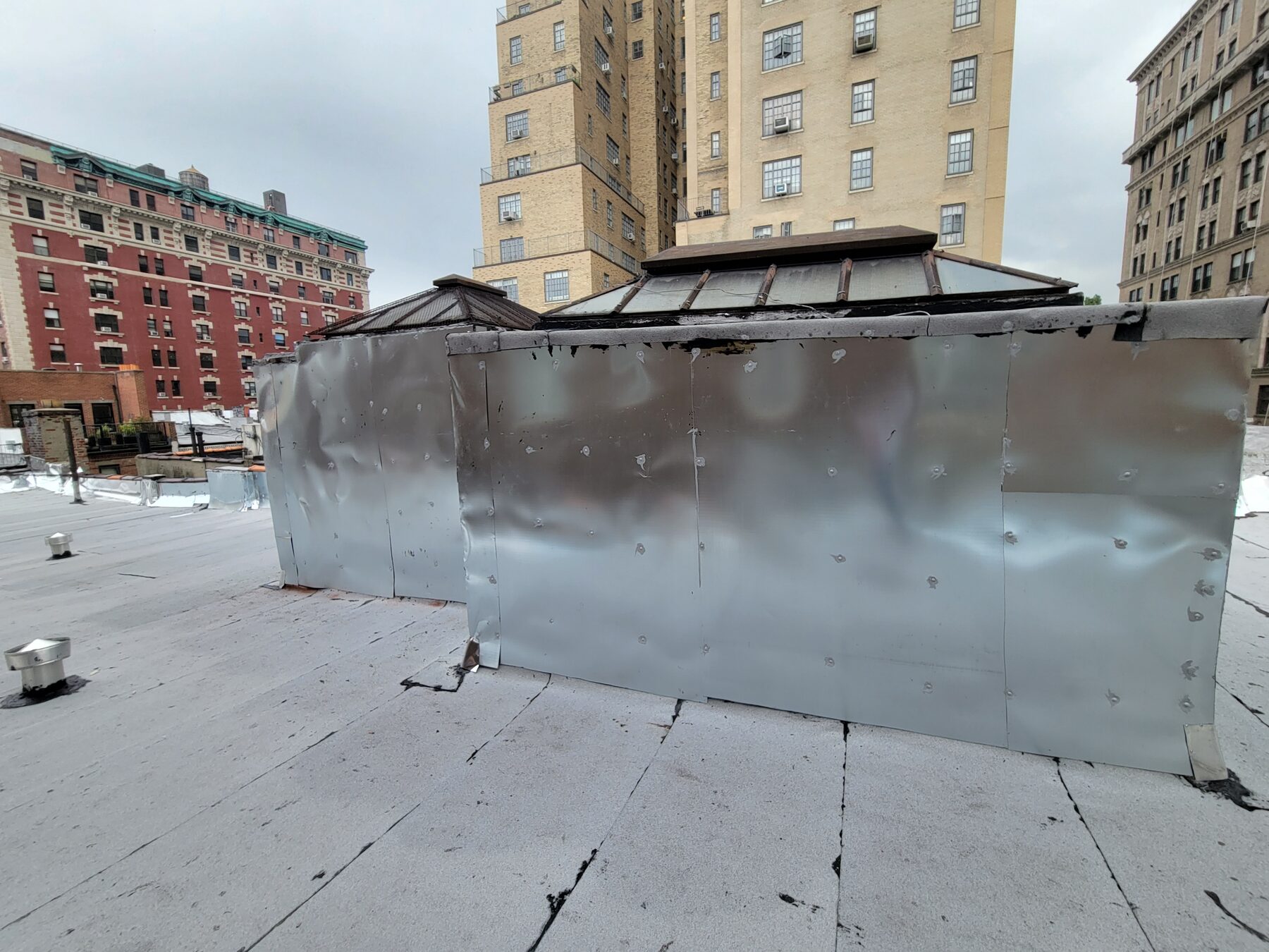 New aluminum sheeting installed on rooftop bulkhead, Upper West Side, Manhattan
