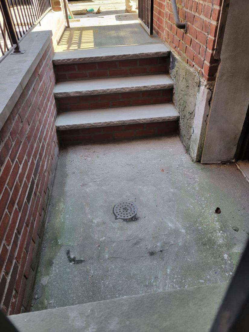 Restored brick and bluestone entry steps