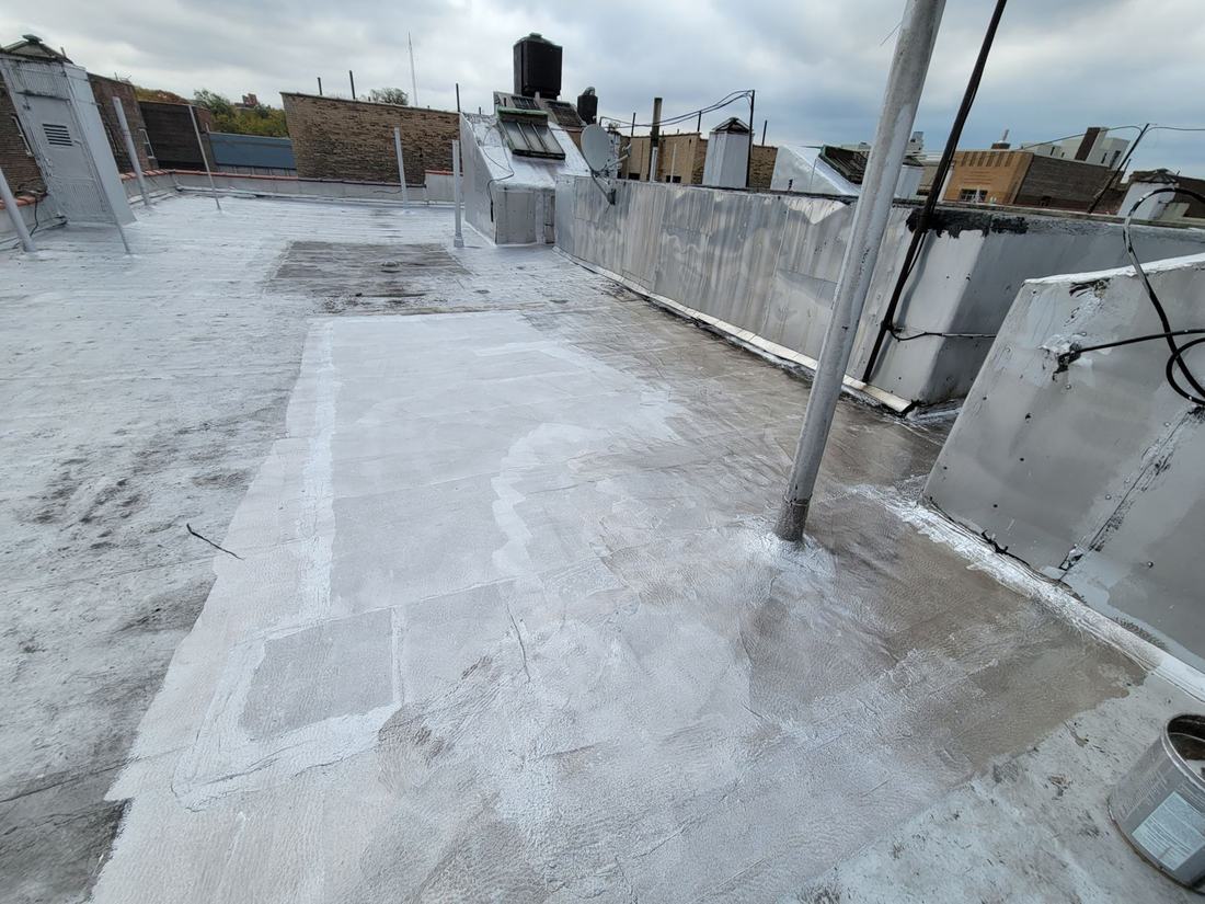Finished white reflective roof coating