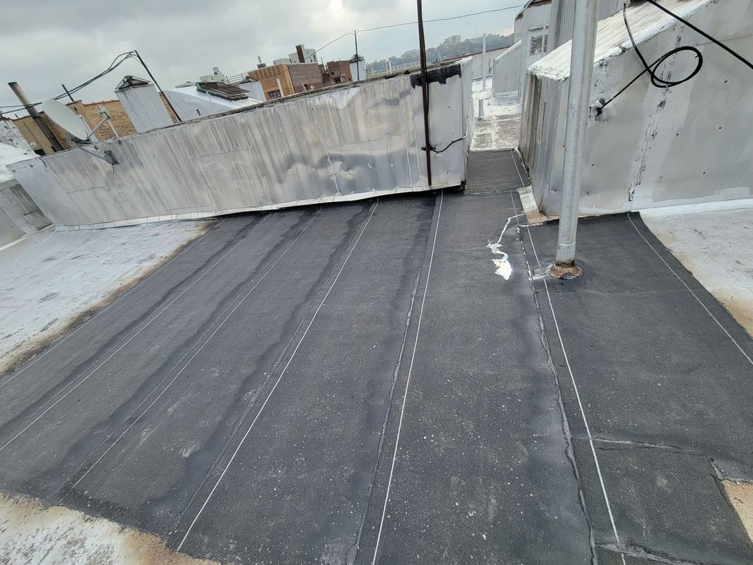 New modified bitumen roof membrane installed